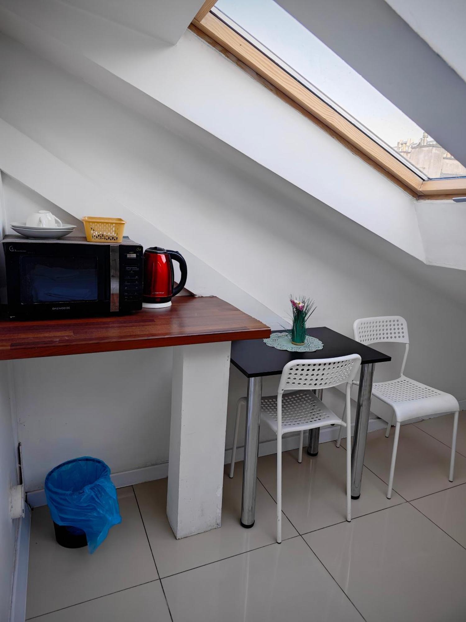 Apartamenty Hoza Attic Studio Varsó Szoba fotó