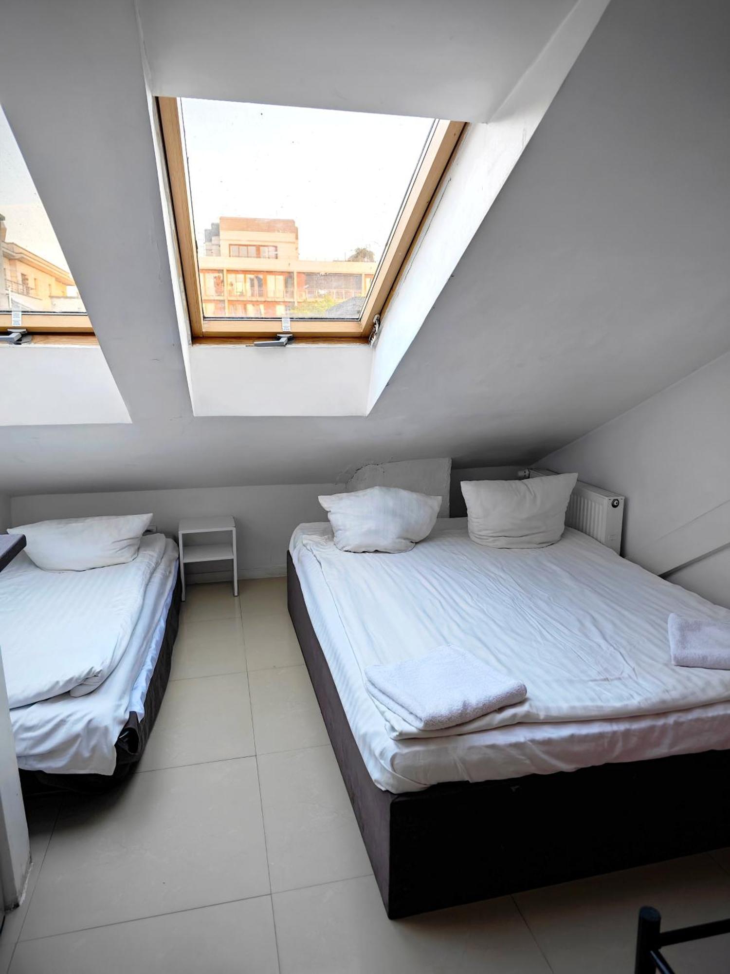 Apartamenty Hoza Attic Studio Varsó Szoba fotó