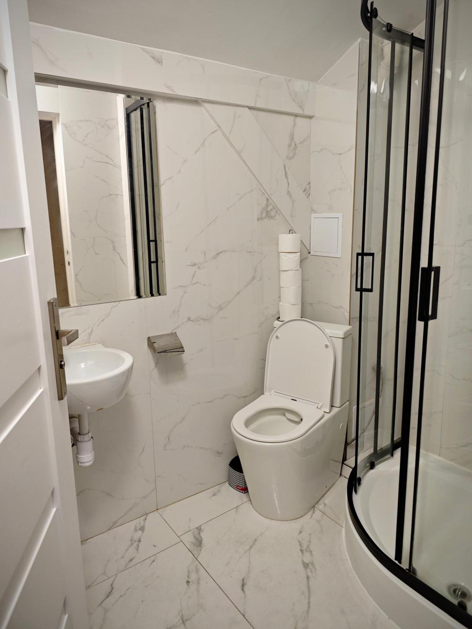 Apartamenty Hoza Attic Studio Varsó Szoba fotó