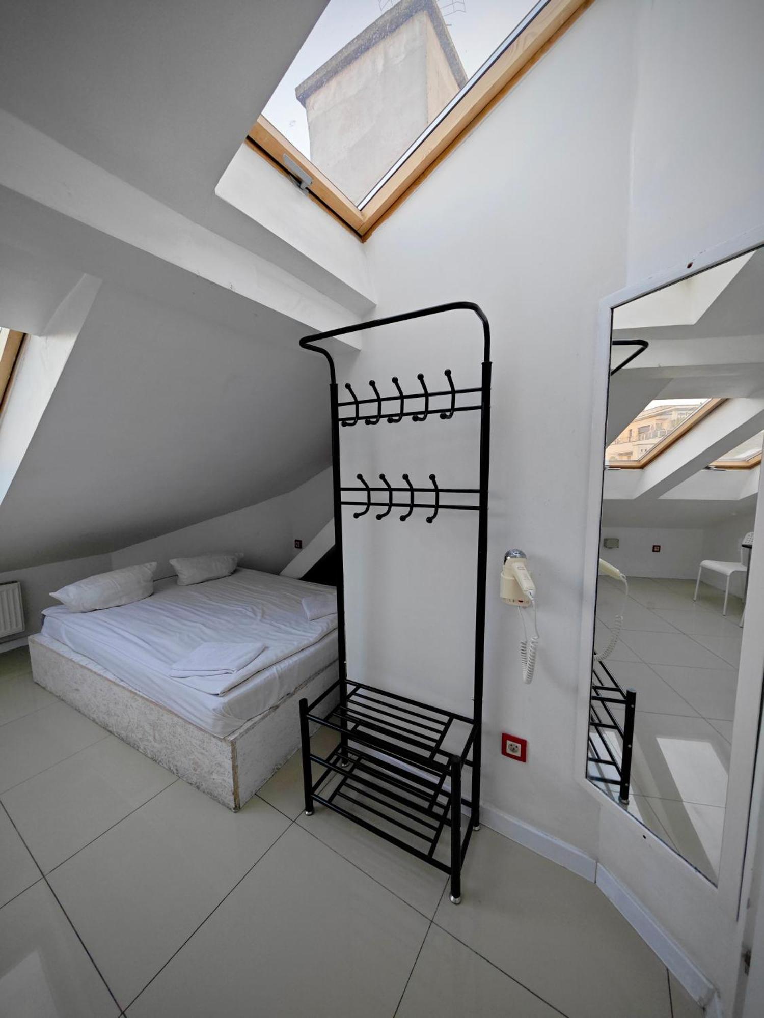 Apartamenty Hoza Attic Studio Varsó Szoba fotó