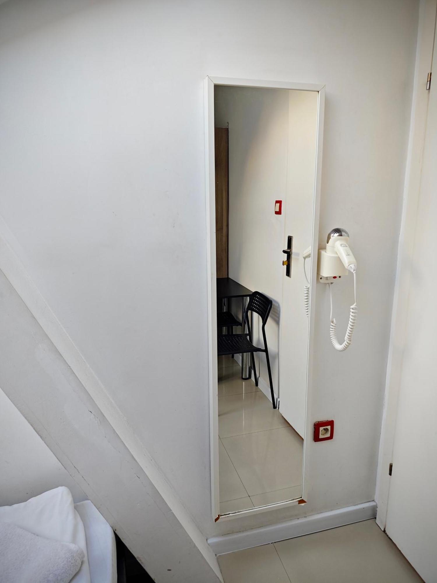 Apartamenty Hoza Attic Studio Varsó Szoba fotó